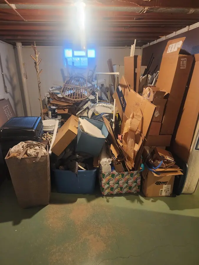 Roll-off dumpster container at job site for 6 Yard Dumpster Rental in Estelle